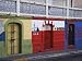 Colorful Town Shop Fronts, Isabela Segunda, Vieques, Puerto Rico Photographic Poster Print by Dennis Flaherty, 16x12