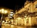 People Walk Past the San Francisco Palace in Bogota, Colombia, in This September 30, 2006 Photo Associated Press Collection Photographic Poster Print by William Fernando Martinez, 64x48