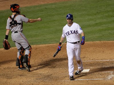 San Francisco Giants v Texas Rangers, Game 4: Michael Young,Buster Posey Photographic Poster Print by Stephen Dunn, 12x16