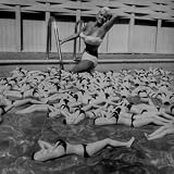 Actress Jayne Mansfield Posing with Shaped Hot Water Bottles Floating around Her at Her Pool Premium Photographic Poster Print by Allan Grant, 16x16
