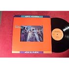 Latino: Aqui Se Puede: Latin Jazz: Vinyl LP: (1984) by  Airto Moreira, Cachete Maldonado, Tony Moreno, Giovanni, Laudir de Oliveira Frank Colon, and Donald Alias 