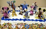 Adorable 15 Piece Mickey Mouse Clubhouse Cake Topper Set Featuring Mickey Mouse, Minnie Mouse, Pluto, Donald Duck, Pete, Goofy, 3 Decorative Mickey Mouse Cake Pieces, And 6 Mickey Mouse Buttons