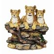 A Safari Fugurine with Three Female Lioness' Sitting On A Bed Rock