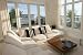 Wallmonkeys Peel and Stick Wall Decals - Interior of Modern Living Room with Beige Corner Suite - 24"W x 16"H Removable Graphic