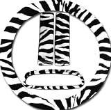 White and black zebra steering wheel cover, seat belt covers and rear view mirror cover. Package in a nice box.
