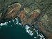 Aerial View of Rocky Coastline with Pounding Surf Photographic Poster Print, 24x18