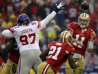 New York Giants and San Francisco 49ers - Jan. 22, 2012: Alex Smith Photographic Poster Print by Julie Jacobson, 24x18