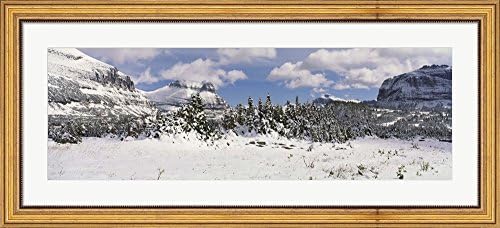 Mountains with trees in winter, Logan Pass, US Glacier National Park, Montana, USA by Panoramic Images Framed Art Print Wall Picture, Wide Gold Frame with Hanging Cleat, 44 x 20 inches