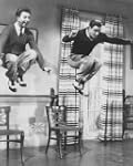 GENE KELLY AS DON LOCKWOOD, DONALD O'...