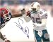 Mark Duper Autographed/Hand Signed Miami Dolphins 8x10 Photo (Vs. Bills)