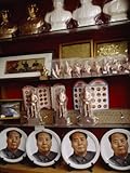 IMAGE OF Statues, Plates and Other Mao Souvenirs for Sale in a Shaoshan Market Photographic Poster Print by Eightfish , 18x24