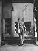 British Soldier on Leave Studying the Display in the Window of a Travel Agency Along Irvine St. Photographic Poster Print