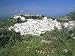 Wild Flowers and White Village with Moorish Castle, Perched on Mountainside, Casares, Costa Del Sol Photographic Poster Print by Pearl Bucknall, 9x12