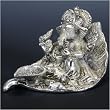 Ganesh Gift: Ganesha Diya Holder on a leaf