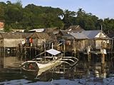 Stilt Houses and Catamaran Fishing Boat, Coron Town, Busuanga Island, Palawan Province, Philippines Photographic Poster Print by Kober Christian, 40x30