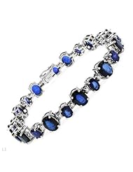 14K White Gold 1.74 CTW Color H-I I1 Diamond and 19.96 CTW Sapphires Ladies Bracelet. Length 7.25 in. Total Item weight 19.4 g.