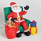 PERE NOEL GONFLABLE SUR CHAISE IL BOUGE LA MAIN, LA TETE ET CHANTE DES CHANSONS - VRAIMENT ETONNANT  LISEZ CECI