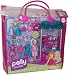 Polly Pocket Fab-tastic Fashions Boutique Playset - Polly with 3 Dresses, 2 Tops, 2 Skirts, 2 Pairs of Shoes, 2 Handbags, Chandelier, Cash Register, Stand with Table Plus Many More Accessories