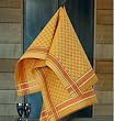 Soliara collection tea towel in vibrant gold