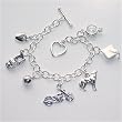 Twi-inspired Sterling Silver Bracelet with Seven Charms