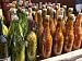 Close View of a Colorful Group of Bottles Containing Foodstuffs Photographic Poster P...