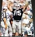Howie Long Autographed/Hand Signed Oakland Raiders 8x10 Ripped Jersey Photo