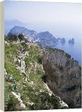 Distant Capri village and Faraglioni Rocks - 40 Inch Canvas Print (101 cm) by Robert Harding