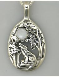 A Stunning Sterling Silver Howling Wolf Howling Pendant Accented with a Genuine Opal