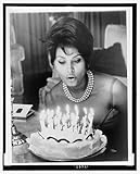 Birthday blowout,Sophia Loren,cake,candles,blow,1961