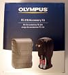 Olympus FE-310 Accessory Kit: Leather Case, 4 AA Batteries, and Charger