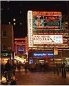 Photographic Print of The Raymond Revuebar with neon signs in red 
light area at night, Soho, London,... from Robert Harding