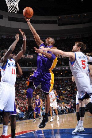 Los Angeles Lakers v Philadelphia 76ers: Kobe Bryant, Jrue Holiday and Andres Nocioni Sports Photographic Poster Print by Jesse D. Garrabrant, 24x36
