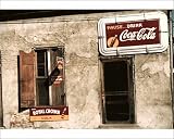 Photographic Prints of MISSISSIPPI CAFE, 1940. Cafe with soft drink signs in Natchez, Mississippi from Granger Art on Demand