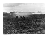 Historic Print (M): Inf. advancing on path through barbed wire entanglements, which tank has just made. One
