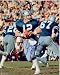 Roger Staubach Autographed/Hand Signed Dallas Cowboys 8x10 Photo (Blue Jersey Dropping Back)
