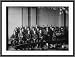 Newswire Photo (XL): Candidates for naturalization seated together in room, hats in laps
