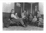 Historic Print (L): Slovenly kitchen living-room of family of Alfred Benoit, 191 N. Front St., a sweeper in