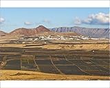 IMAGE OF Photographic Prints of View across black volcanic cinder fields to the town of Soo and the Risco de from Robert Harding