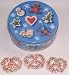 Scott's Cakes 1 lb. Dark Chocolate Covered Pretzel with Rainbow Jimmies in a Christmas Cookie Tin
