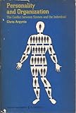 Personality and organization : the conflict between system and the individual