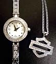 Harley-Davidson® Bulova Women's Watch and Pendant. White pearlized dial. WR50m/165ft. 76X100