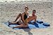 The Beach Hugger Beach Towel for Two Image
