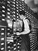 Man Looking at Film Records Containing Social Security Numbers at the Social Security Board Photographic Poster Print by Thomas D. Mcavoy, 12x16