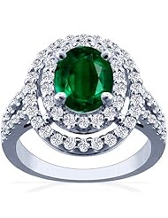 Platinum Oval Cut Emerald Ring With Sidestones