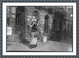 Historic Print (M): Tired woman with heavy load of home-work. Lafayette St., near Astor Place. Location: New