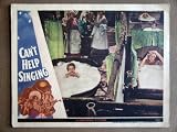 EB05 Can`t Help Singing DEANNA DURBIN 1944 Lobby Card. Here`s a terrific lobby card from the original release of CANT HELP SINGING featuring a great image of DEANNA DURBIN and ROBERT PAIGE. Lobby card is in EXCELLENT-condition. Some pinholes, no stains, no tears, faint fold not visible from front of card
