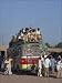 Photo Jigsaw 16x12 (40x30cm) Overloaded bus with men riding on the roof near Multan in Pakistan by Robert Harding