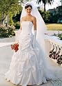 David's Bridal Wedding Dress: Satin pick-up ballgown with corset bodice and brooch detail. Style T9104