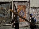Couple of Pilgrims Carrying a Cross on the Via Dolorosa During Good Friday Catholic Procession Photographic Poster Print by Eitan Simanor, 24x18