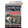 Journalists Under Fire: Information War and Journalistic Practices
